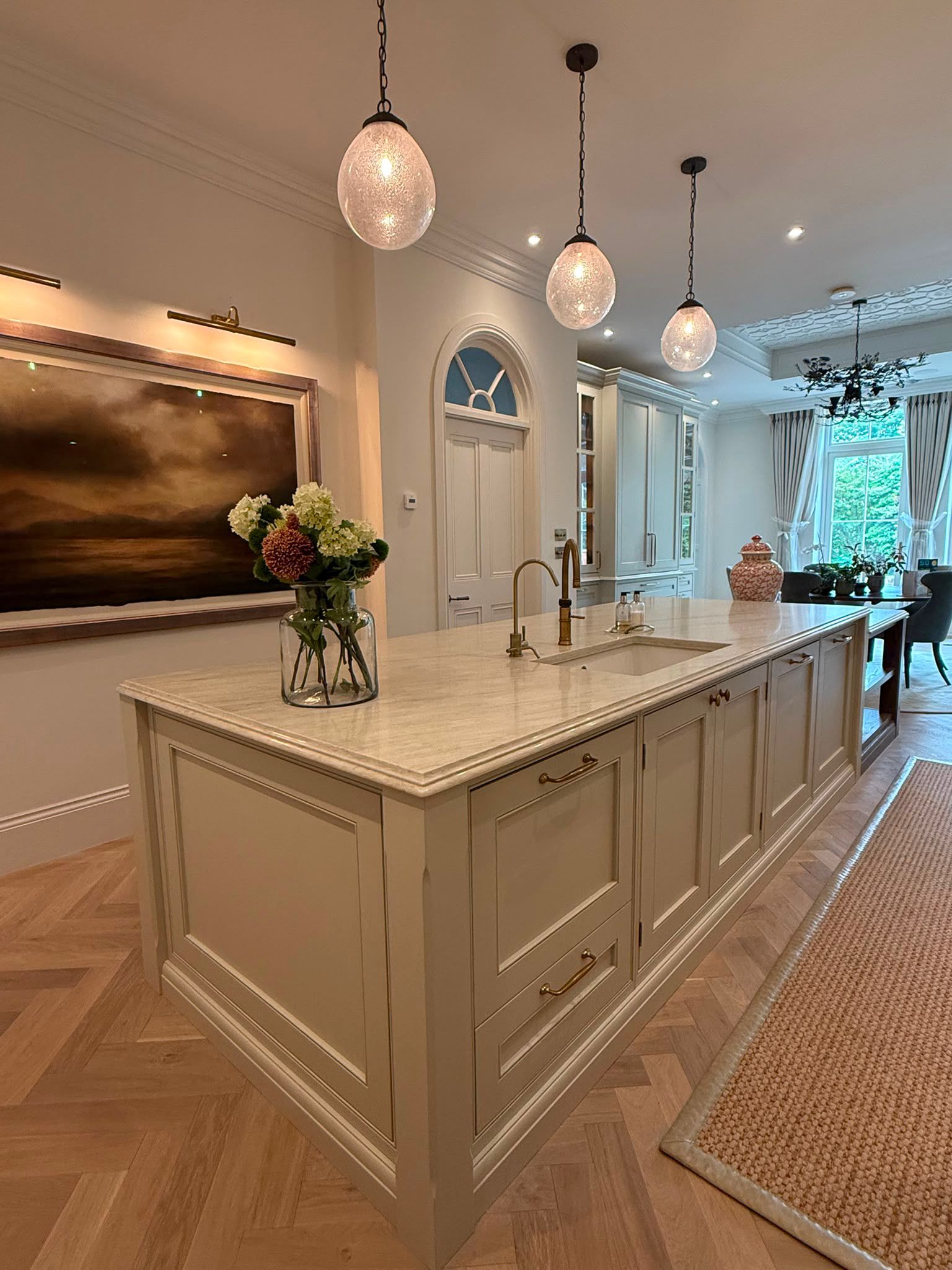 Taj Mahal quartz kitchen island with inset sink