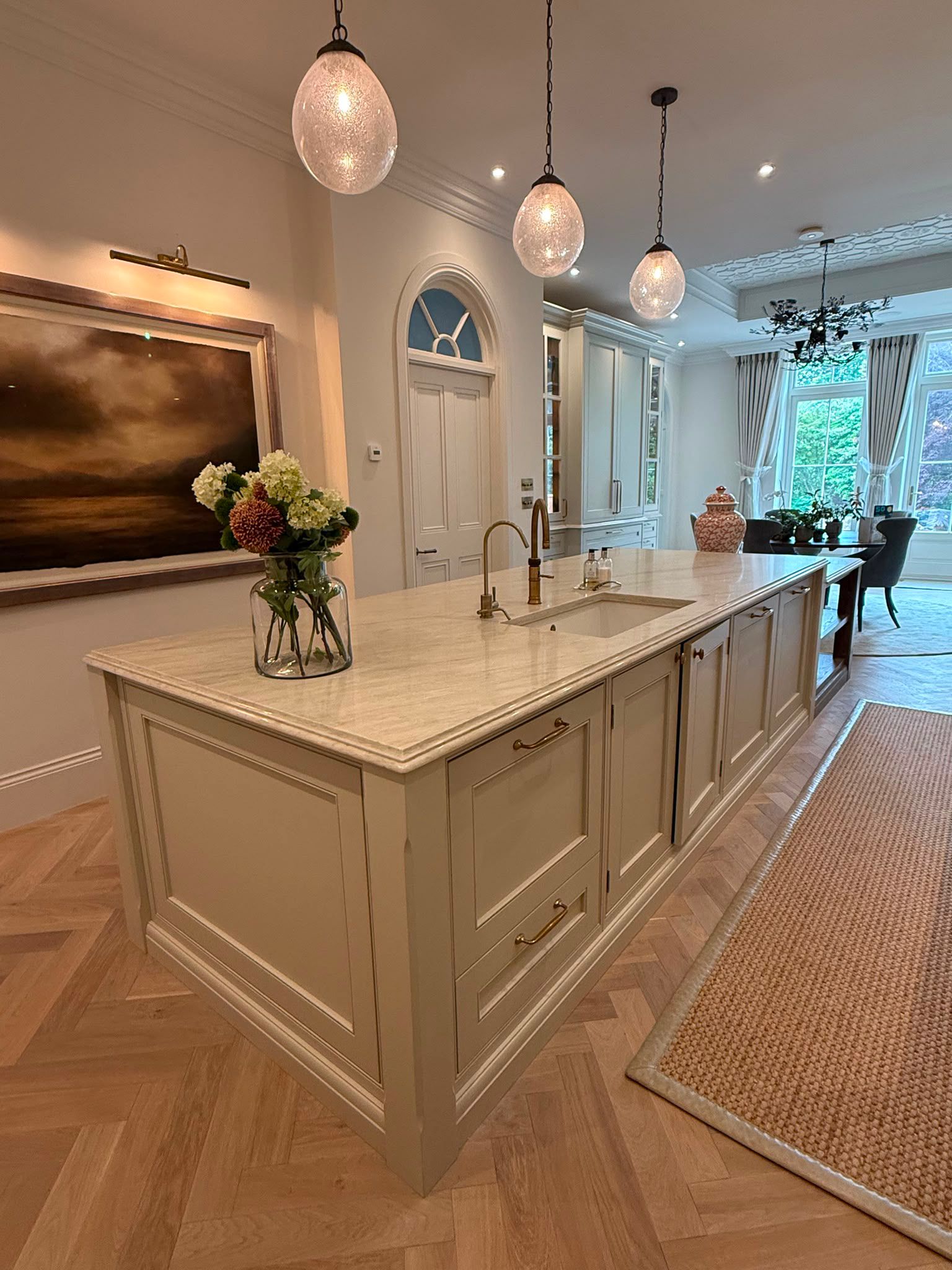 Taj Mahal quartz waterfall-edge kitchen island in North Shields