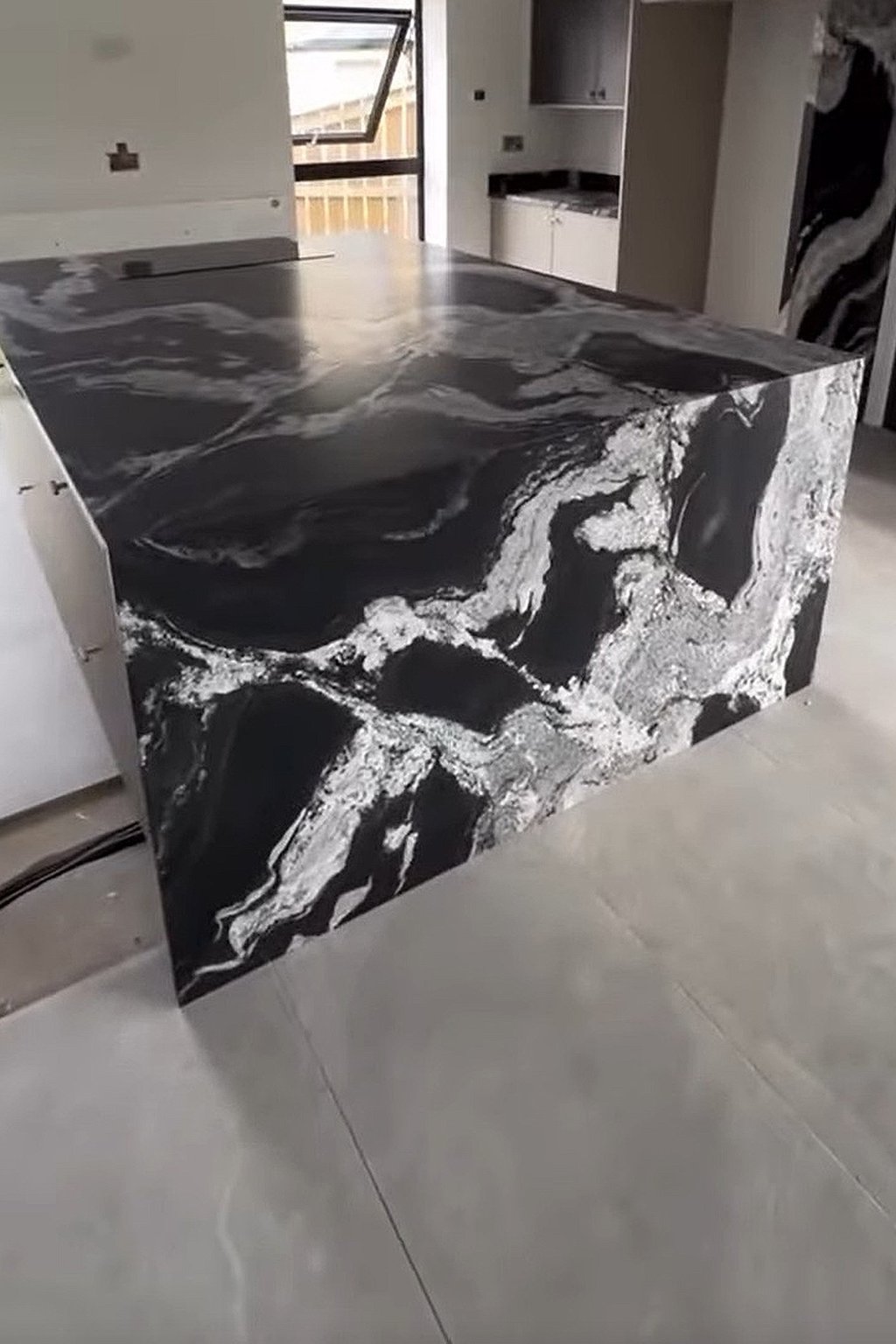 Polished granite waterfall island installed for a nearby Wallsend project